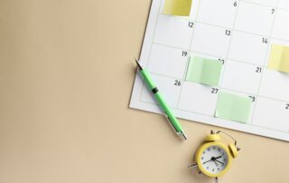 Calendar with sticky notes; pest-free in busy times