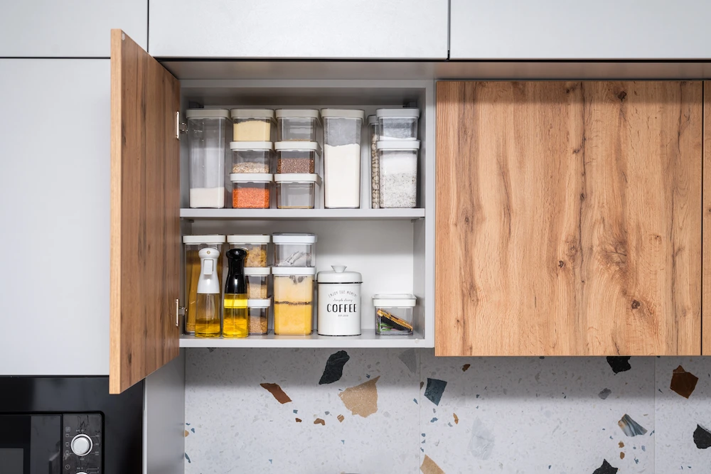open kitchen cabinet with organized containers