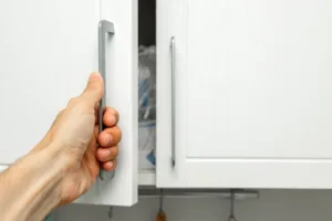 opening a cabinet