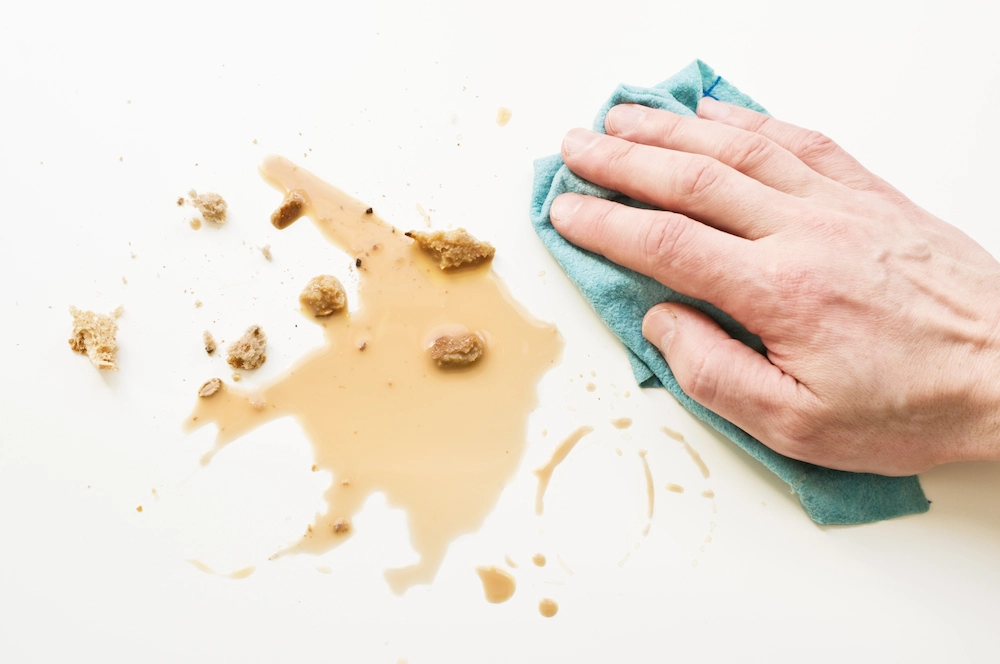 cleaning a coffee spill